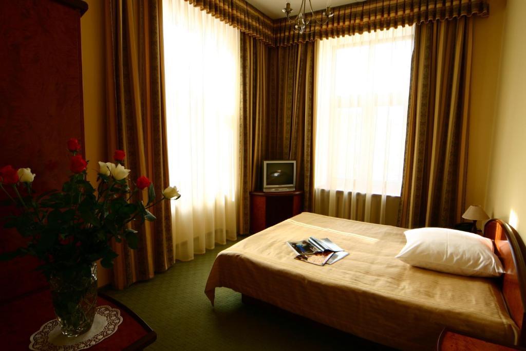 Wien Hotel Lviv Oda fotoğraf